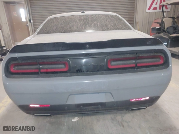 2021 Dodge Challenger GT with VIN 2C3CDZKG6MH642079, listed as a IAAI auction lot 41612713 with 76,863 mi miles. Bid and sale history available at carsss.com. Image 16.