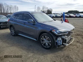 2016 BMW X1 xDrive28i z VIN WBXHT3Z39G4A50798, wystawiony jako Copart lot #50827875 z przebiegiem 114 178 mil mil oraz Szkoda całkowita • Salvage title. Historia ofert i sprzedaży dostępna na DreamBid. Obrazek 4.
