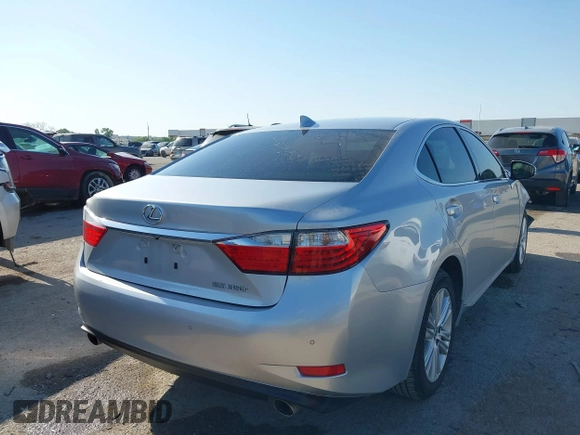 2015 Lexus ES 330 with VIN JTHBK1GG2F2179200, listed as a IAAI auction lot 42035802 with 149,275 mi miles and . Bid and sale history available at DreamBid. Image 4.