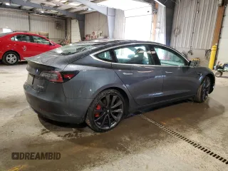 2020 Tesla Model 3 Performance z VIN 5YJ3E1EC8LF640891, wystawiony jako Copart lot #52377615 z przebiegiem 77 343 mil mil oraz Szkoda całkowita • Salvage title. Historia ofert i sprzedaży dostępna na DreamBid. Obrazek 3.