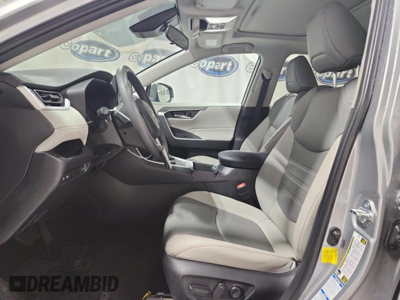 2022 Toyota RAV4 Hybrid XLE Premium with VIN 4T3B6RFV1NU080099, listed as a Copart auction lot 60206905 with 59,859 mi miles and Clean title. Bid and sale history available at DreamBid. Image 7.