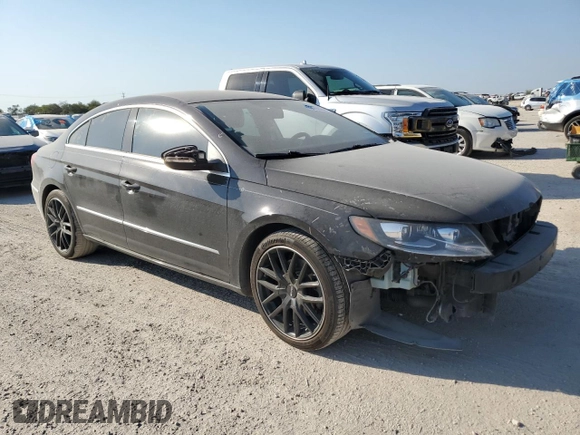 2014 Volkswagen CC R-Line with VIN WVWBN7AN7EE537598, listed as a Copart auction lot 73974244 with 139,476 mi miles and Salvage Title. Bid and sale history available at carsss.com. Image 4.