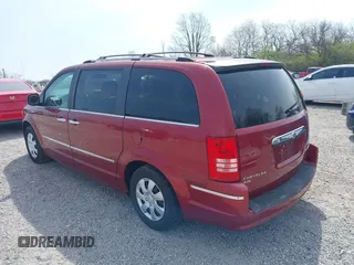 2010 Chrysler Town & Country Limited with VIN 2A4RR7DX2AR358067, listed as a IAAI auction lot 42065257 with 188,290 mi miles and . Bid and sale history available at carsss.com. Image 3.
