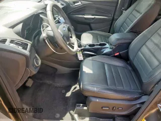 2015 Ford Escape Titanium with VIN 1FMCU0J92FUB80769, listed as a Copart auction lot 61988435 with 103,212 mi miles and Salvage title. Bid and sale history available at DreamBid. Image 7.
