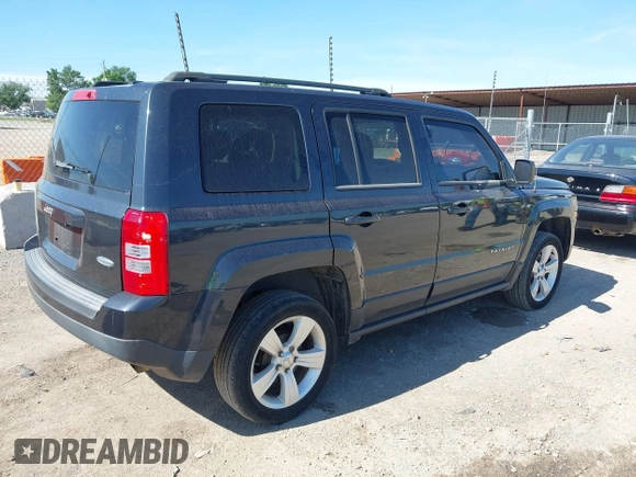 2014 Jeep Patriot Latitude with VIN 1C4NJPFB5ED624378, listed as a IAAI auction lot 42195410 with 234,059 mi miles and . Bid and sale history available at carsss.com. Image 4.
