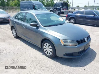 2014 Volkswagen Jetta S with VIN 3VW2K7AJ2EM328671, listed as a IAAI auction lot 42603027 with 156,137 mi miles and . Bid and sale history available at DreamBid. Image 1.