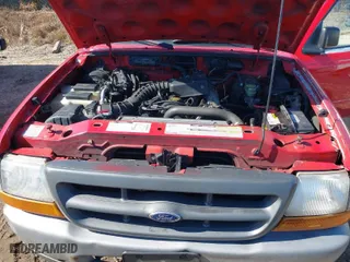 2000 Ford Ranger XL with VIN 1FTYR10C1YTA98667, listed as a IAAI auction lot 41650372 with 174,517 mi miles. Bid and sale history available at carsss.com. Image 10.