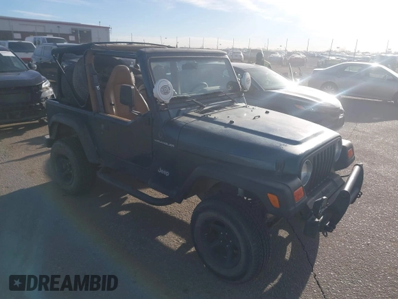 1997 Jeep Wrangler SE with VIN 1J4FY29PXVP409498, listed as a IAAI auction lot 41818698 with 150,086 mi miles. Bid and sale history available at carsss.com. Image 1.