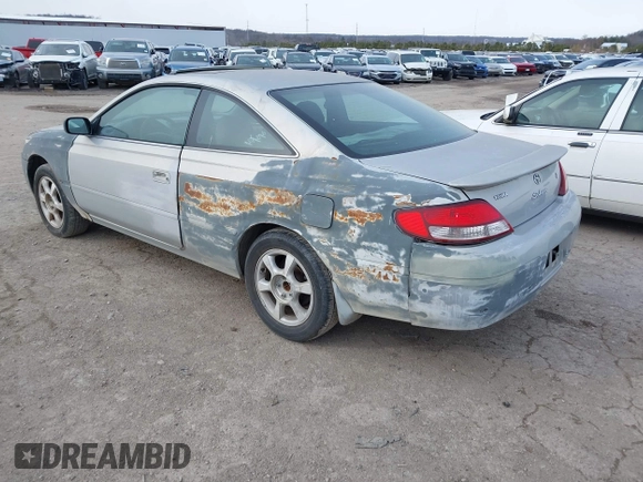 1999 Toyota Solara SE with VIN 2T1CF22P7XC106169, listed as a IAAI auction lot 41291391 with 297,339 mi miles. Bid and sale history available at carsss.com. Image 3.