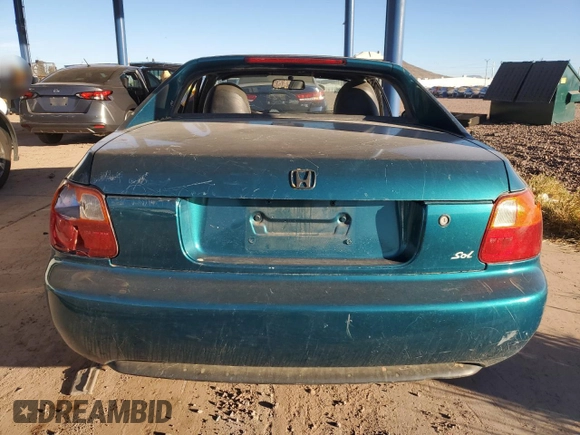 1995 Honda Civic z VIN JHMEG1245SS001206, wystawiony jako Copart lot #77599784 z przebiegiem 197 722 mil mil oraz Szkoda całkowita • Salvage title. Historia ofert i sprzedaży dostępna na DreamBid. Obrazek 6.