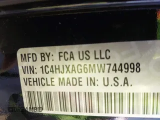2021 Jeep Wrangler Sport S with VIN 1C4HJXAG6MW744998, listed as a IAAI auction lot 42170965 with 59,373 mi miles and . Bid and sale history available at DreamBid. Image 9.