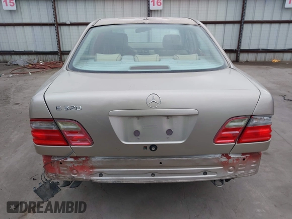2002 Mercedes-Benz E-Class with VIN WDBJF65J42B394017, listed as a IAAI auction lot 41706917 with 188,883 mi miles. Bid and sale history available at carsss.com. Image 17.