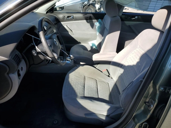 2003 Volkswagen Passat GLS with VIN WVWPD63B23P251682, listed as a Copart auction lot 87305174 with 147,235 mi miles and Salvage Title. Bid and sale history available at carsss.com. Image 7.