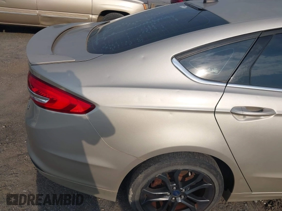 2018 Ford Fusion SE z VIN 3FA6P0HD6JR279927, wystawiony jako IAAI lot #42430172 z przebiegiem 145 080 mil mil oraz . Historia ofert i sprzedaży dostępna na DreamBid. Obrazek 18.