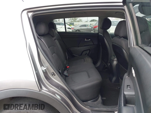 2013 Kia Sportage LX with VIN KNDPBCA23D7529658, listed as a IAAI auction lot 42473877 with 114,797 mi miles and . Bid and sale history available at DreamBid. Image 8.