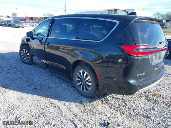 2023 Chrysler Pacifica Hybrid Touring L with VIN 2C4RC1L79PR592477, listed as a IAAI auction lot 40823333 with 8,729 mi miles. Bid and sale history available at carsss.com. Image 3.