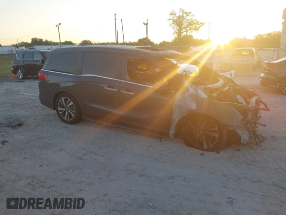 2023 Honda Odyssey Touring with VIN 5FNRL6H84PB053582, listed as a IAAI auction lot 42012108 with Not Provided miles and . Bid and sale history available at DreamBid. Image 1.