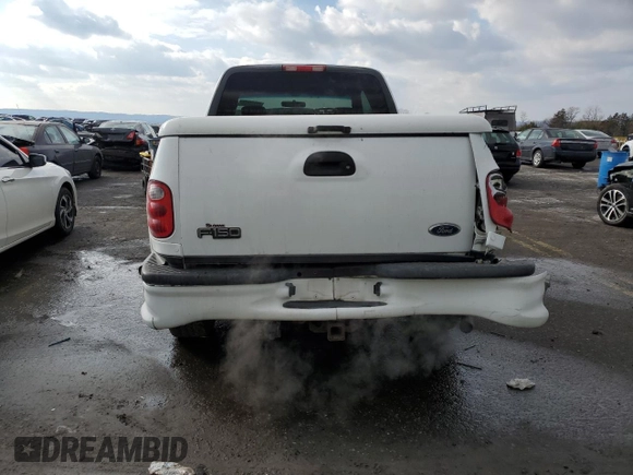 2002 Ford F-150 XL z VIN 2FTRX08L12CA26636, wystawiony jako Copart lot #89254825 z przebiegiem 133 637 mil mil oraz Szkoda całkowita • Salvage title. Historia ofert i sprzedaży dostępna na DreamBid. Obrazek 6.