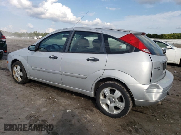 2007 Ford Focus S with VIN 1FAHP37N67W268162, listed as a Copart auction lot 71736384 with 69,391 mi miles and Salvage Title. Bid and sale history available at DreamBid. Image 2.