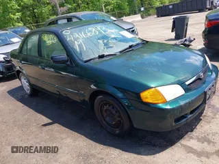 1999 Mazda Protege DX z VIN JM1BJ222XX0138557, wystawiony jako IAAI lot #42166893 z przebiegiem 89 859 mil mil oraz . Historia ofert i sprzedaży dostępna na DreamBid. Obrazek 1.