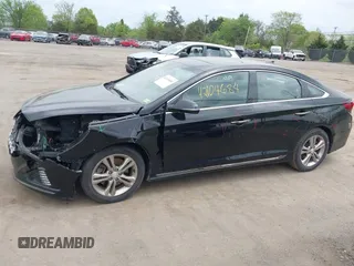 2018 Hyundai Sonata Sport with VIN 5NPE34AF0JH710477, listed as a IAAI auction lot 42104684 with 158,260 mi miles and . Bid and sale history available at carsss.com. Image 15.