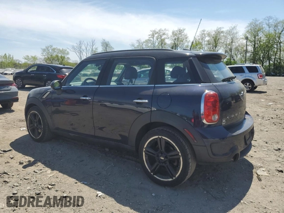 2015 MINI Countryman S with VIN WMWZC3C52FWT05882, listed as a Copart auction lot 54399525 with 125,971 mi miles and Salvage title. Bid and sale history available at DreamBid. Image 2.
