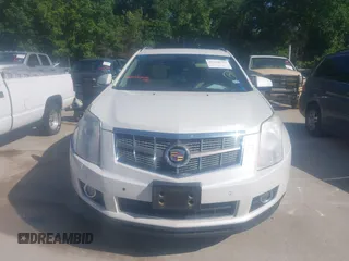 2011 Cadillac SRX Premium Collection z VIN 3GYFNCEYXBS579760, wystawiony jako IAAI lot #42238707 z przebiegiem Nie podano mil oraz . Historia ofert i sprzedaży dostępna na DreamBid. Obrazek 11.