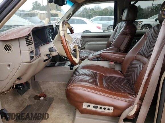2000 Cadillac Escalade z VIN 1GYEK63R9YR218680, wystawiony jako Copart lot #87393204 z przebiegiem 295 494 mil mil oraz Szkoda całkowita • Salvage title. Historia ofert i sprzedaży dostępna na DreamBid. Obrazek 7.