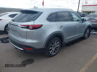 2021 Mazda CX-9 Grand Touring with VIN JM3TCBDY8M0515065, listed as a IAAI auction lot 41359765 with 80,221 mi miles and . Bid and sale history available at carsss.com. Image 4.