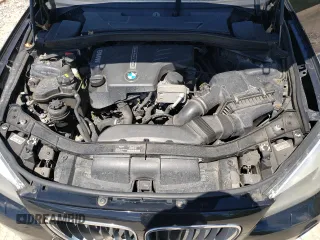 2015 BMW X1 xDrive28i z VIN WBAVL1C53FVY34119, wystawiony jako Copart lot #56539735 z przebiegiem 130 336 mil mil oraz Tytuł czysty. Historia ofert i sprzedaży dostępna na DreamBid. Obrazek 11.