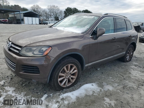 2013 Volkswagen Touareg Lux with VIN WVGEF9BP1DD006810, listed as a Copart auction lot 87906695 with 172,473 mi miles and Clean Title. Bid and sale history available at DreamBid. Image 1.