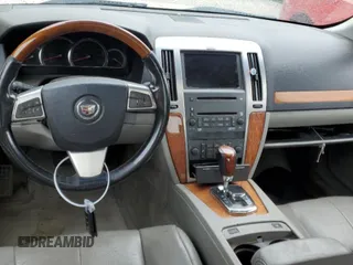 2008 Cadillac STS RWD z VIN 1G6DZ67A280195039, wystawiony jako Copart lot #81965734 z przebiegiem 133 334 mil mil oraz Szkoda całkowita • Salvage title. Historia ofert i sprzedaży dostępna na DreamBid. Obrazek 8.