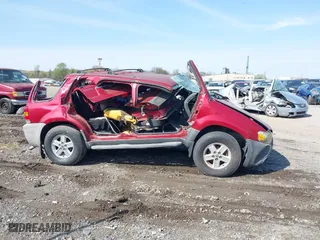 2007 Ford Escape XLS with VIN 1FMYU92Z57KB17526, listed as a IAAI auction lot 31863470 with 122,236 mi miles. Bid and sale history available at carsss.com. Image 13.