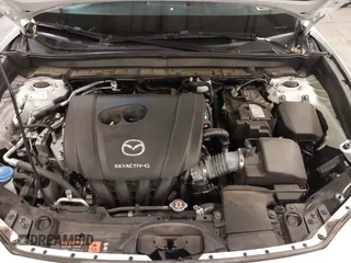 2021 Mazda CX-30 Preferred z VIN 3MVDMBCL2MM210902, wystawiony jako IAAI lot #42522203 z przebiegiem 42 995 mil mil oraz . Historia ofert i sprzedaży dostępna na DreamBid. Obrazek 10.