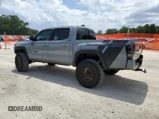 2020 Toyota Tacoma SR5 z VIN 3TMAZ5CN0LM115004, wystawiony jako Copart lot #55343295 z przebiegiem 82 865 mil mil oraz Nie do naprawy • Non repairable. Historia ofert i sprzedaży dostępna na DreamBid. Obrazek 2.
