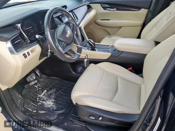 2017 Cadillac XT5 FWD with VIN 1GYKNARS8HZ162612, listed as a Copart auction lot 58727265 with 100,494 mi miles and Clean title. Bid and sale history available at DreamBid. Image 7.