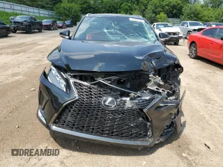 2021 Lexus RX 350 F Sport with VIN 2T2YZMDAXMC297790, listed as a Copart auction lot 63022735 with 76,819 mi miles and Clean title. Bid and sale history available at DreamBid. Image 5.