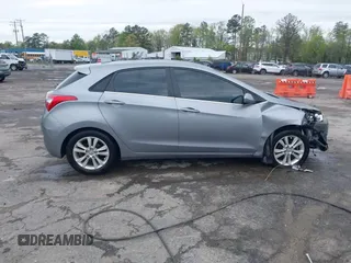 2013 Hyundai Elantra GT with VIN KMHD35LE1DU058318, listed as a IAAI auction lot 42036716 with 146,845 mi miles. Bid and sale history available at carsss.com. Image 13.