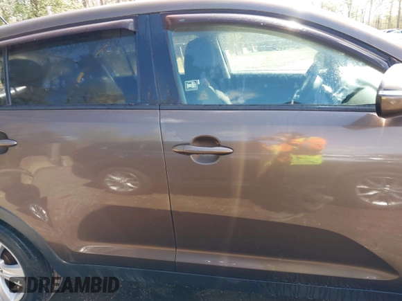 2012 Kia Sportage LX with VIN KNDPBCA27C7293143, listed as a IAAI auction lot 41980919 with 206,457 mi miles and . Bid and sale history available at DreamBid. Image 13.