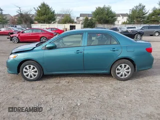 2009 Toyota Corolla with VIN JTDBL40E29J017358, listed as a IAAI auction lot 41041604 with 233,205 mi miles. Bid and sale history available at carsss.com. Image 14.