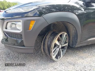 2020 Hyundai Kona Limited z VIN KM8K33A52LU591422, wystawiony jako IAAI lot #42324828 z przebiegiem 59 957 mil mil oraz . Historia ofert i sprzedaży dostępna na DreamBid. Obrazek 18.
