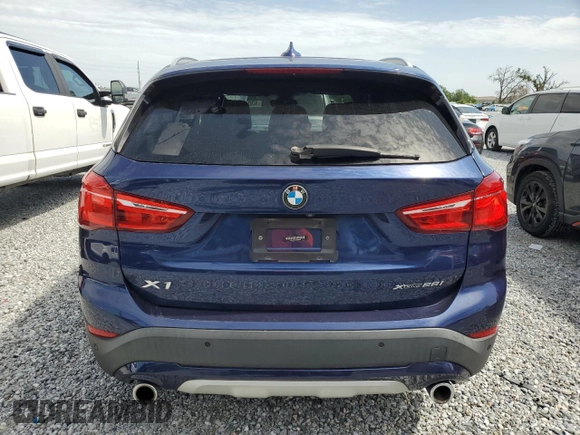 2020 BMW X1 xDrive28i with VIN WBXJG9C0XL5R33141, listed as a Copart auction lot 63040155 with 165,172 mi miles and Clean title. Bid and sale history available at DreamBid. Image 6.