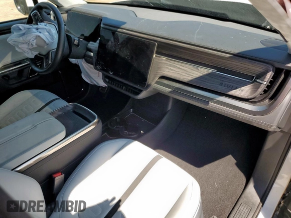 2023 Rivian R1S Launch Edition z VIN 7PDSGABL9PN010792, wystawiony jako Copart lot #56359465 z przebiegiem 24 319 mil mil oraz Szkoda całkowita • Salvage title. Historia ofert i sprzedaży dostępna na DreamBid. Obrazek 8.