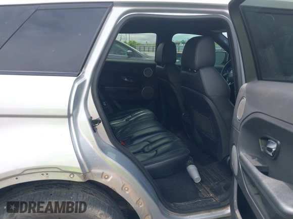 2013 Land Rover Range Rover Evoque Pure Plus z VIN SALVP2BG7DH782112, wystawiony jako IAAI lot #42203360 z przebiegiem 142 201 mil mil oraz . Historia ofert i sprzedaży dostępna na DreamBid. Obrazek 8.