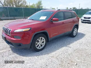 2014 Jeep Cherokee Altitude with VIN 1C4PJMCB7EW185958, listed as a IAAI auction lot 42002583 with 118,256 mi miles and . Bid and sale history available at DreamBid. Image 2.