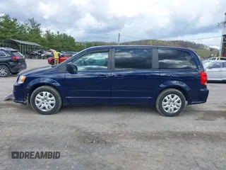 2016 Dodge Grand Caravan SE with VIN 2C4RDGBG4GR146450, listed as a IAAI auction lot 42015145 with 128,725 mi miles. Bid and sale history available at carsss.com. Image 14.