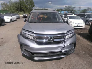 2022 Honda Pilot Touring 7-Passenger with VIN 5FNYF6H60NB013465, listed as a IAAI auction lot 40139627 with 78,161 mi miles. Bid and sale history available at carsss.com. Image 12.