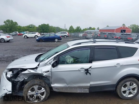 2013 Ford Escape SE with VIN 1FMCU9G94DUC52497, listed as a IAAI auction lot 42352704 with 194,648 mi miles and . Bid and sale history available at DreamBid. Image 15.