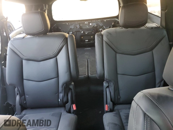 2023 Cadillac XT6 AWD Sport z VIN 1GYKPGRS6PZ108561, wystawiony jako Copart lot #71052284 z przebiegiem 31 496 mil mil oraz Szkoda całkowita • Salvage title. Historia ofert i sprzedaży dostępna na DreamBid. Obrazek 10.