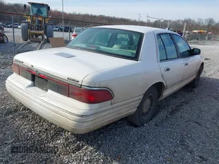 1997 Mercury Grand Marquis LS with VIN 2MELM75W5VX715872, listed as a IAAI auction lot 41612631 with 202,743 mi miles and . Bid and sale history available at DreamBid. Image 4.